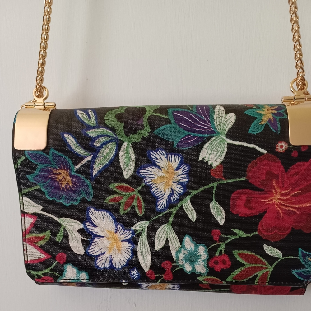 Black floral clutch purse